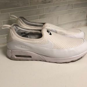 Nike slip on sneakers.